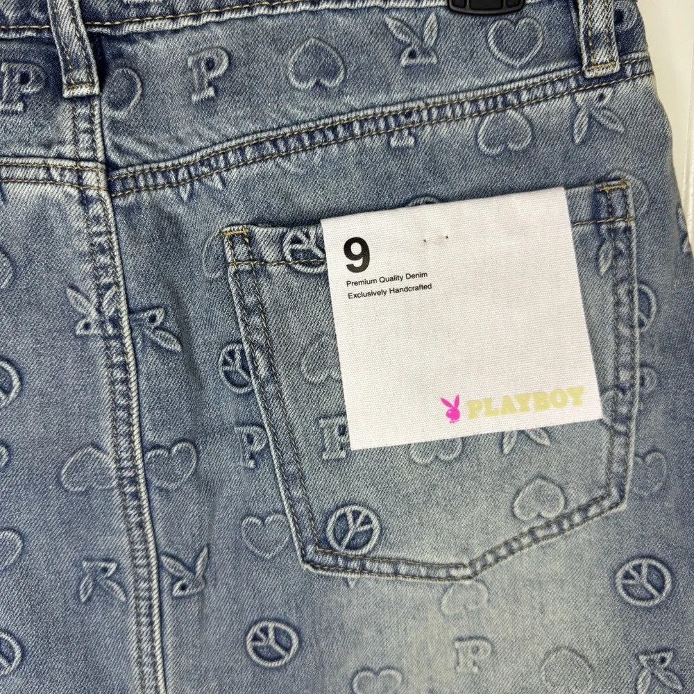 PLAYBOY Bunny Embossed Denim Mini Skirt